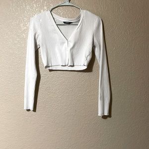 white, long sleeve, SHIEN  crop top in size medium with a v neck.